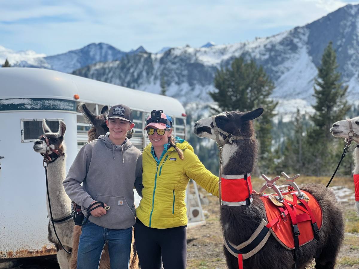 Team at the trailhead with pack llamas